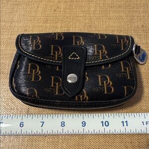 Dooney and Bourke signature black tan wristlet clutch bag, no leather wristlet.